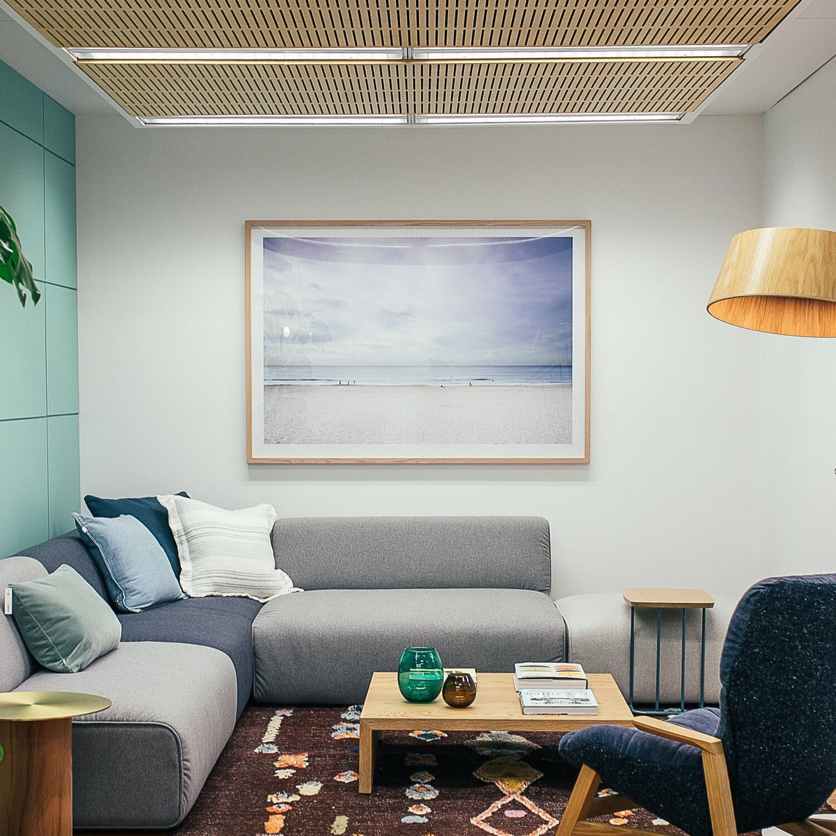 This artwork is hung at the perfect height above the couch (Photo by Rachel Claire)
