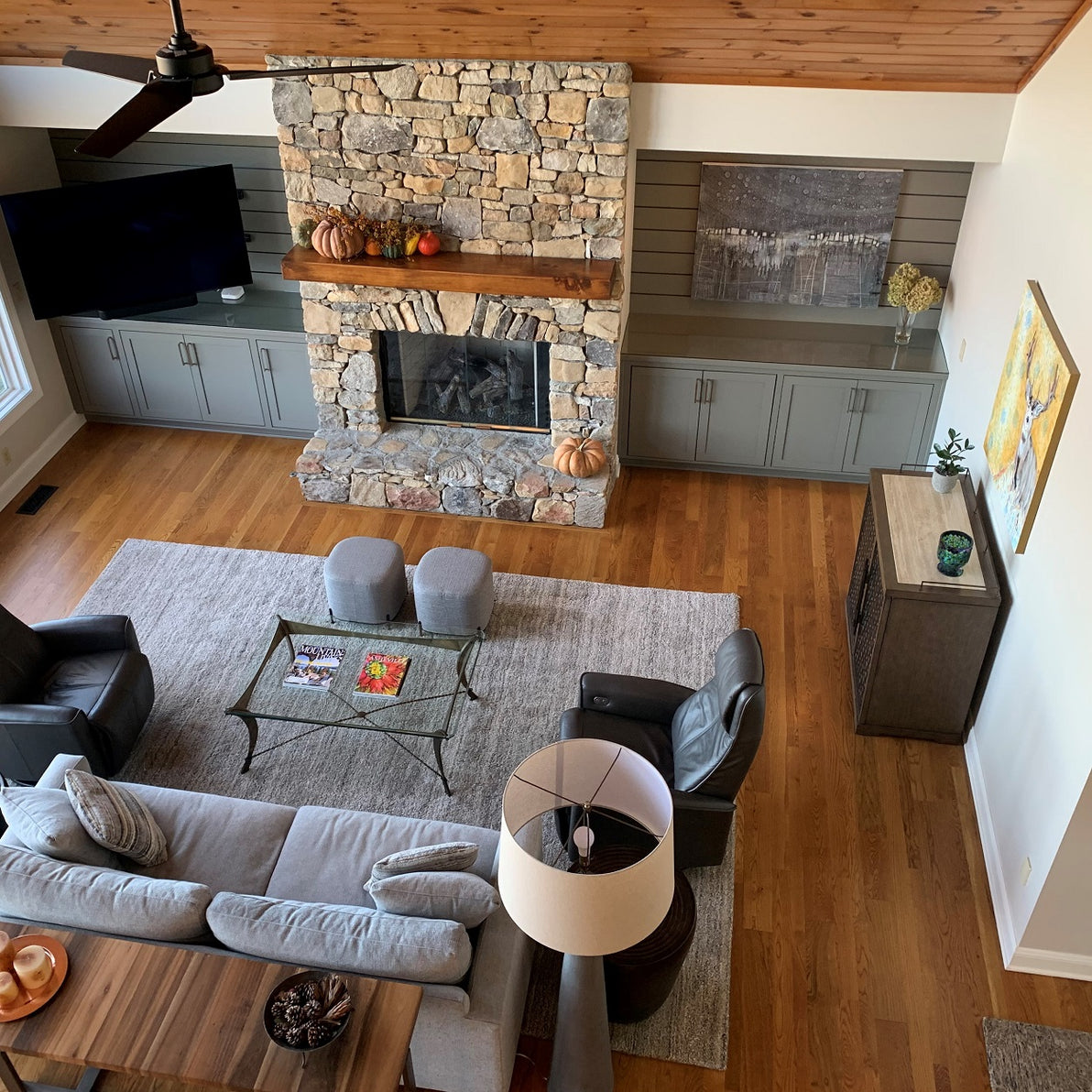  UGallery collector Carl’s living room, graced with Pat Forbes’ “Night Rain”, and Alana Clumeck’s “Bliss” 