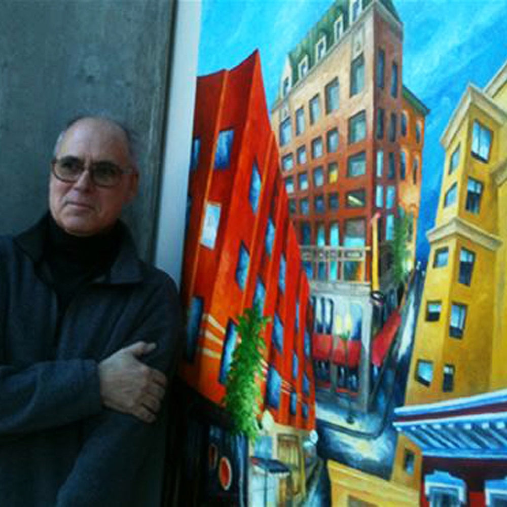  UGallery artist Mitchell Freifeld standing next to one of his modern architecture paintings 