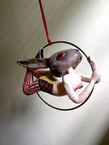 sculpture by Kat Silver titled Bunny Trapeze