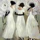 Original art for sale at UGallery.com | Girls in White Dresses by Mary Pratt | $3,000 | oil painting | 40' h x 40' w | thumbnail 1