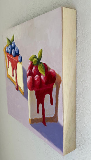 Two Slices of Cheesecake by Pat Doherty |  Side View of Artwork 
